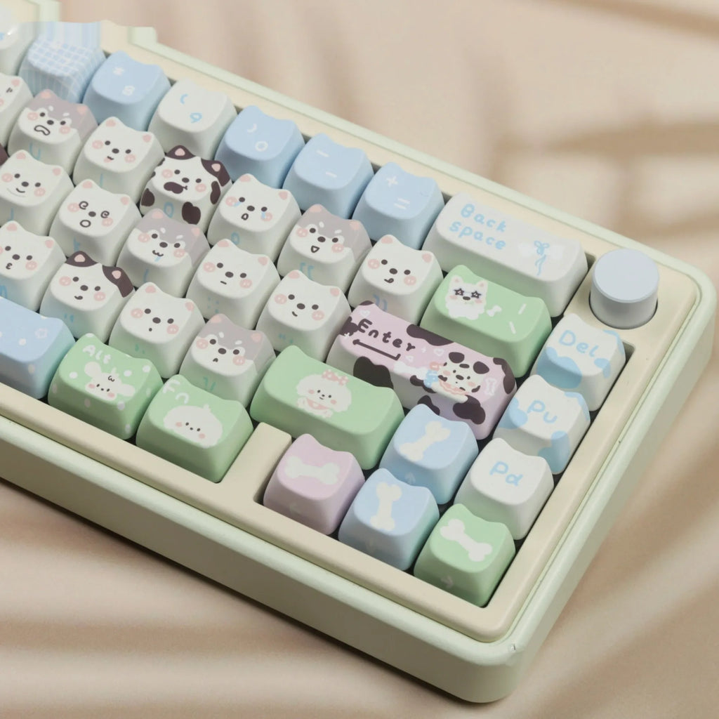 PBT sublimation keycap set showing colourful cat and puppy designs for mechanical keyboards
