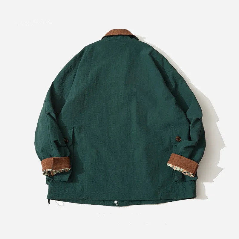 Green casual polyester jacket with side seam pockets on a person, showing front view