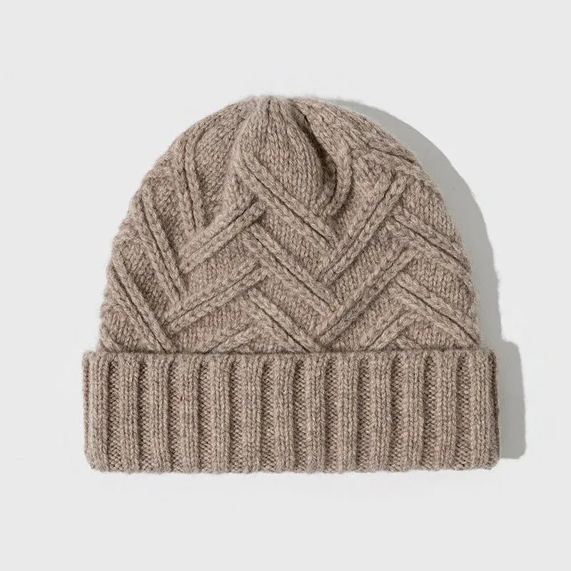 Wool knitted dome hat in ankela red colour with totem pattern detail