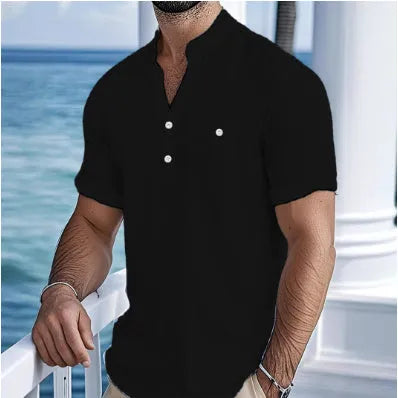 Man wearing a light-coloured linen blend stand collar t-shirt with short sleeves.