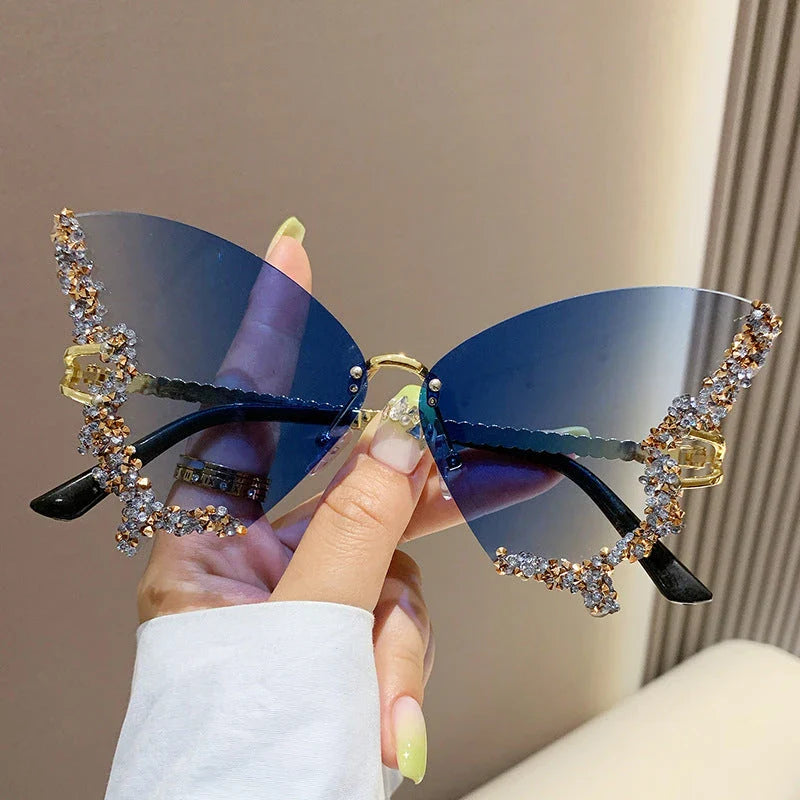 Luxury diamond-studded butterfly sunglasses in various gradient color options, featuring a vintage-inspired design and high-quality materials for a fashionable and glamorous look.