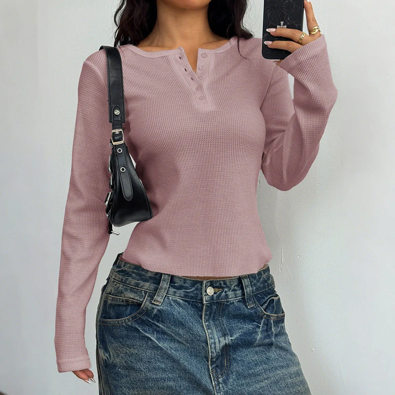 Women's slim fit long sleeve vest t-shirt with button front closure in polyester fabric, available in milky white, pink, and black colour options with S to XL sizing for versatile layering