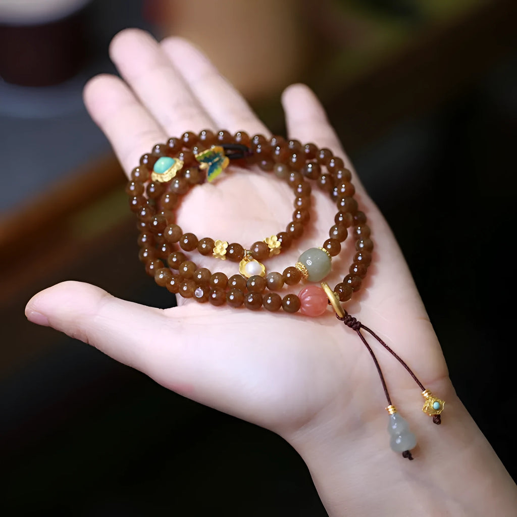Brown jade Hetian jade three-ring bracelet with silver butterfly and gourd charms