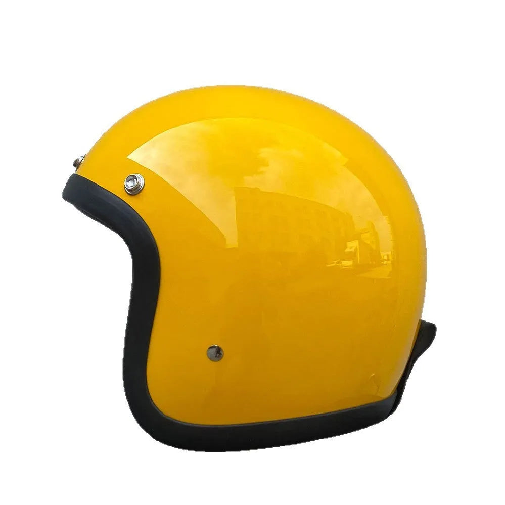 Glass fibre FRP retro half motorcycle helmet shown in a cement grey colour.