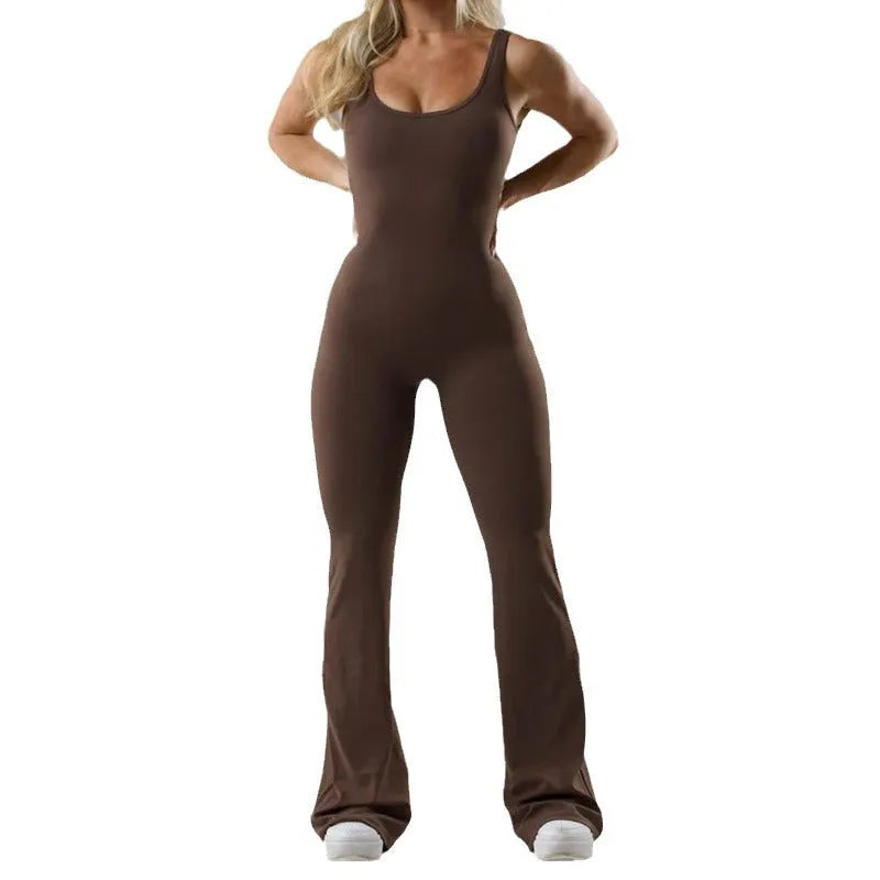 Women's black milk silk yoga bodysuit jumpsuit with seamless design and mid waist.