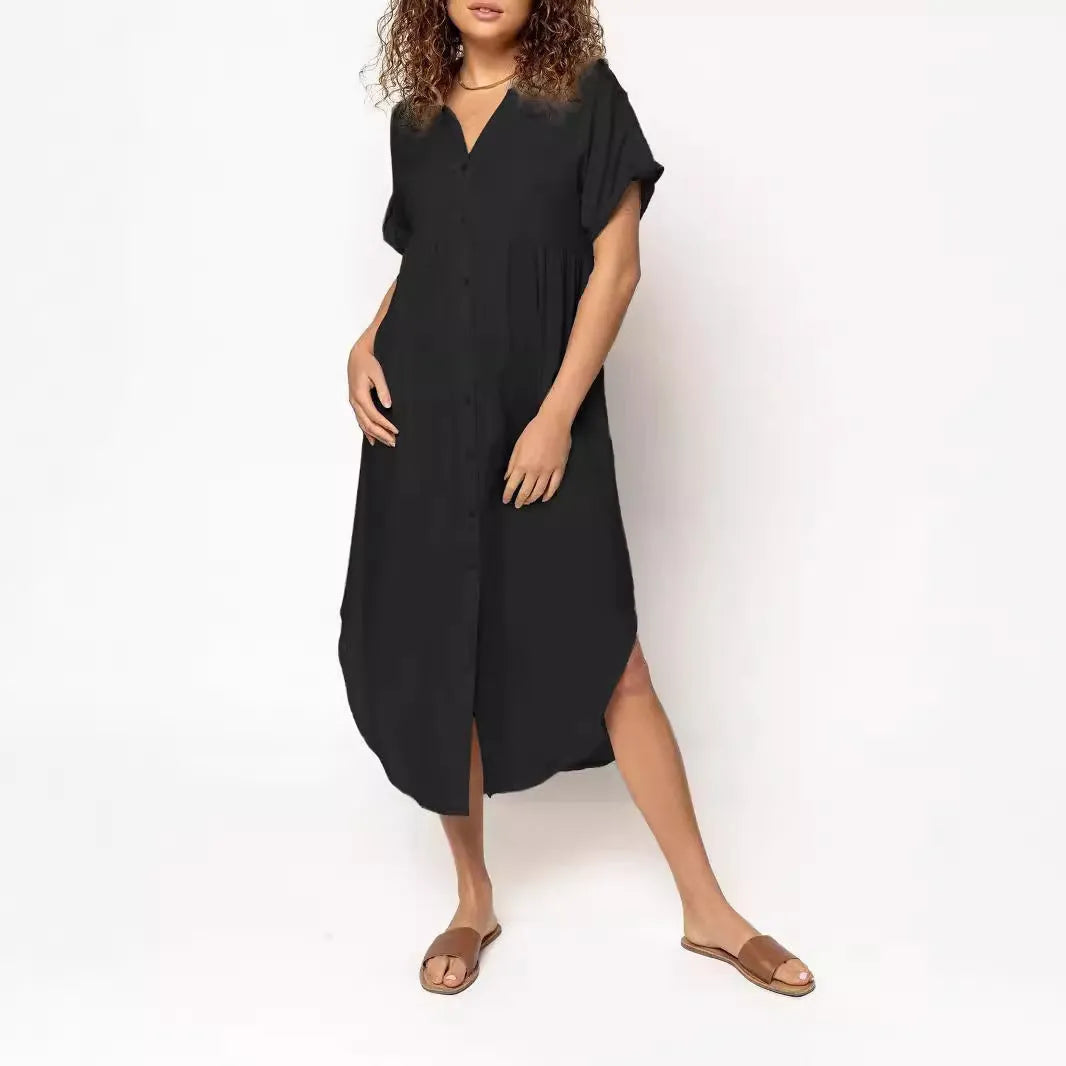 Loose fit solid colour midi dress with button fastening on a hanger.