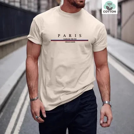 Man modelling a loose-fit, short-sleeved, letter-print T-shirt in pure cotton, shown in apricot colour.
