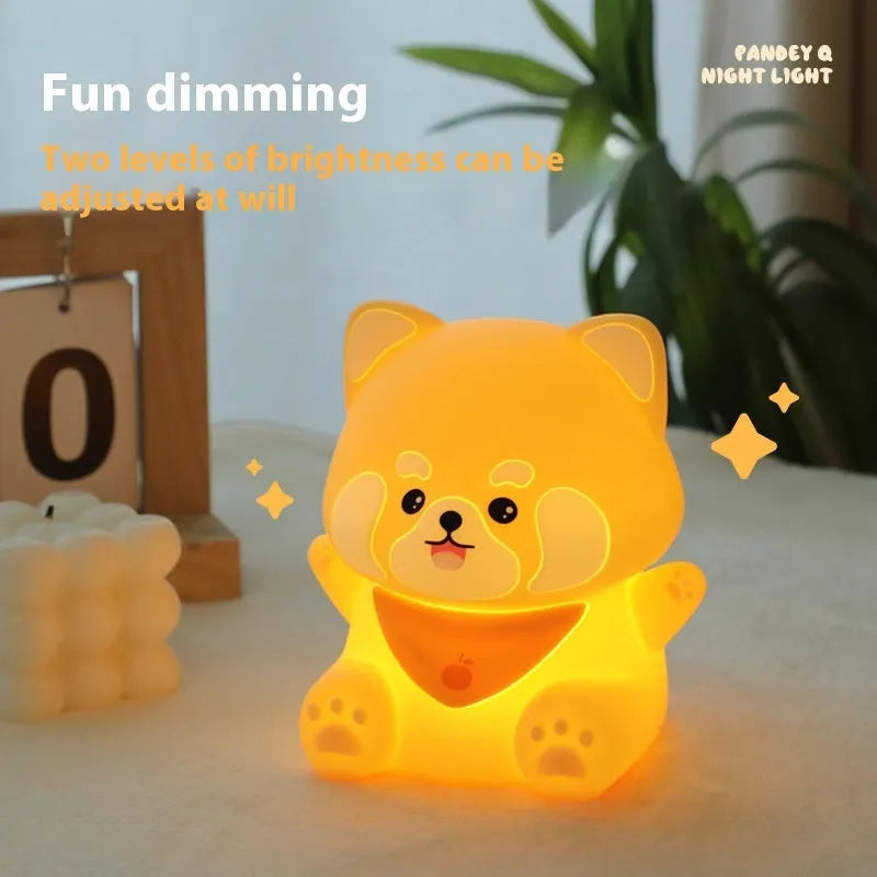 New Homehold Lesser Panda bedside lamp with silicone shade and USB charging cable on a table