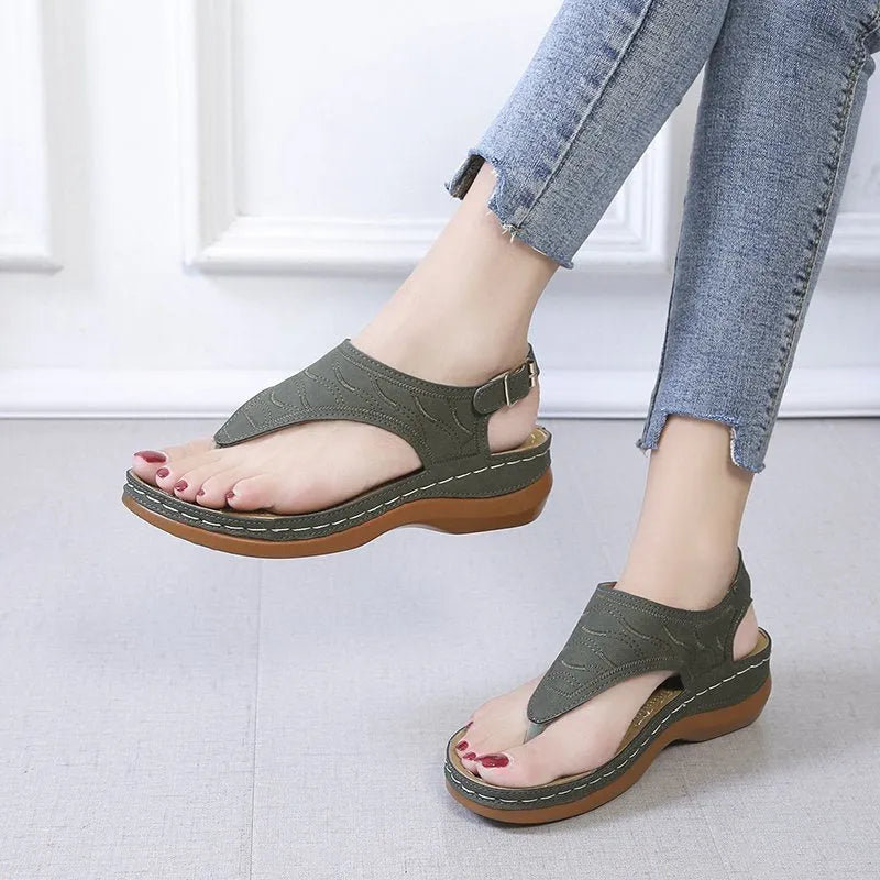 Women's casual wedge heel flip flop sandals with adjustable back strap in red, green, black, blue, and khaki