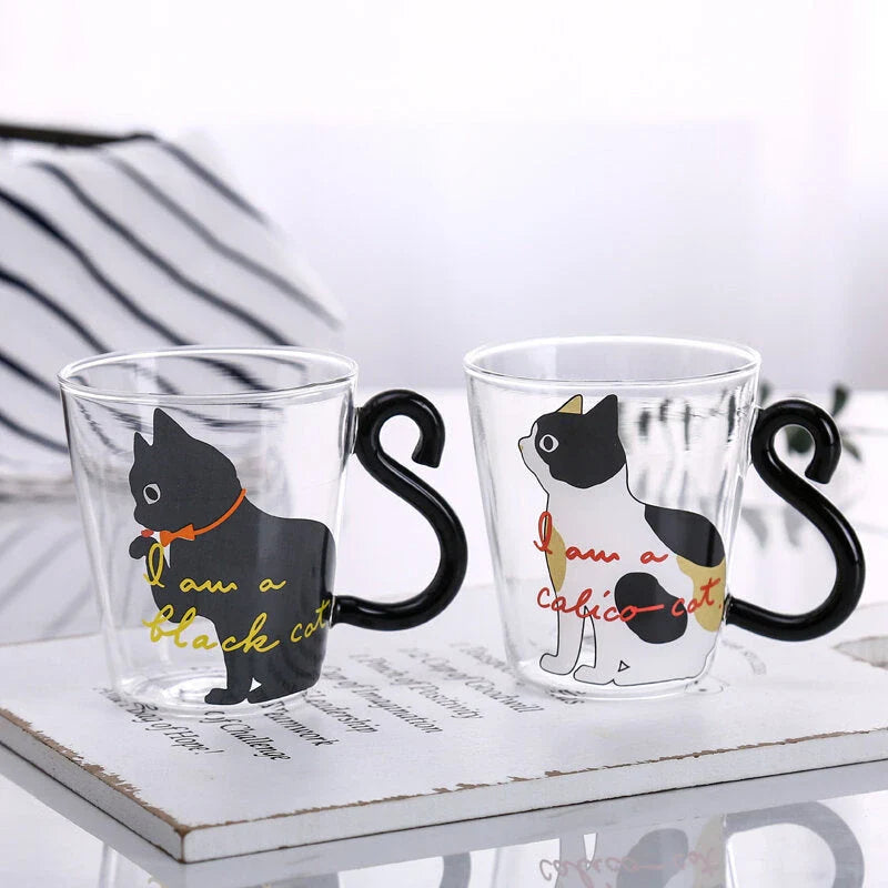 Adorable cat-themed glass mug with tail-shaped handle, perfect for hot and cold beverages