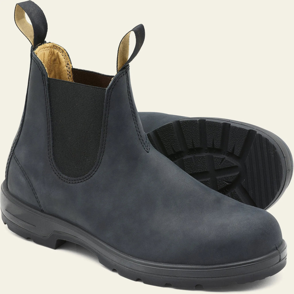 A pair of vintage-style brown unisex Chelsea boots with a round toe and low horseshoe heel.
