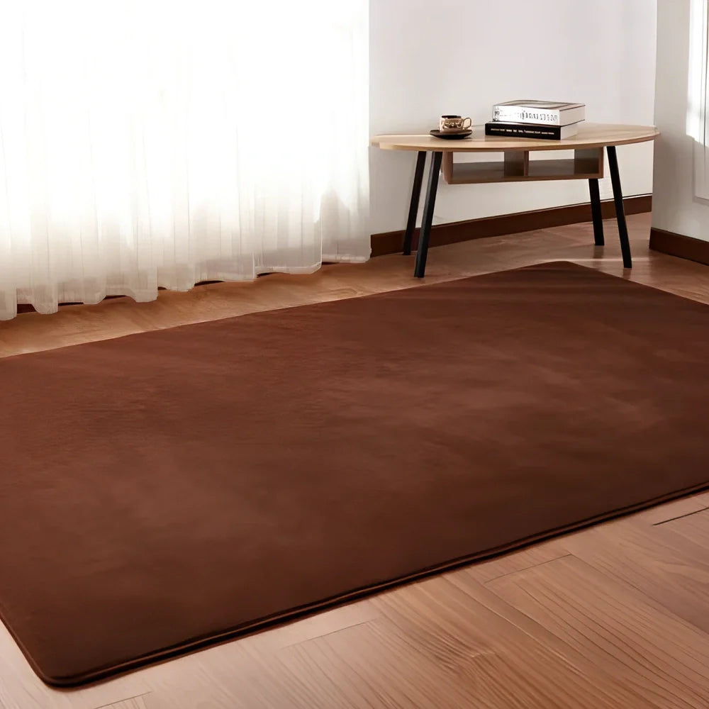 White plush solid rectangle area rug with non-slip dotted base, 100x160cm size, three-layer velvet and sponge construction for home floors