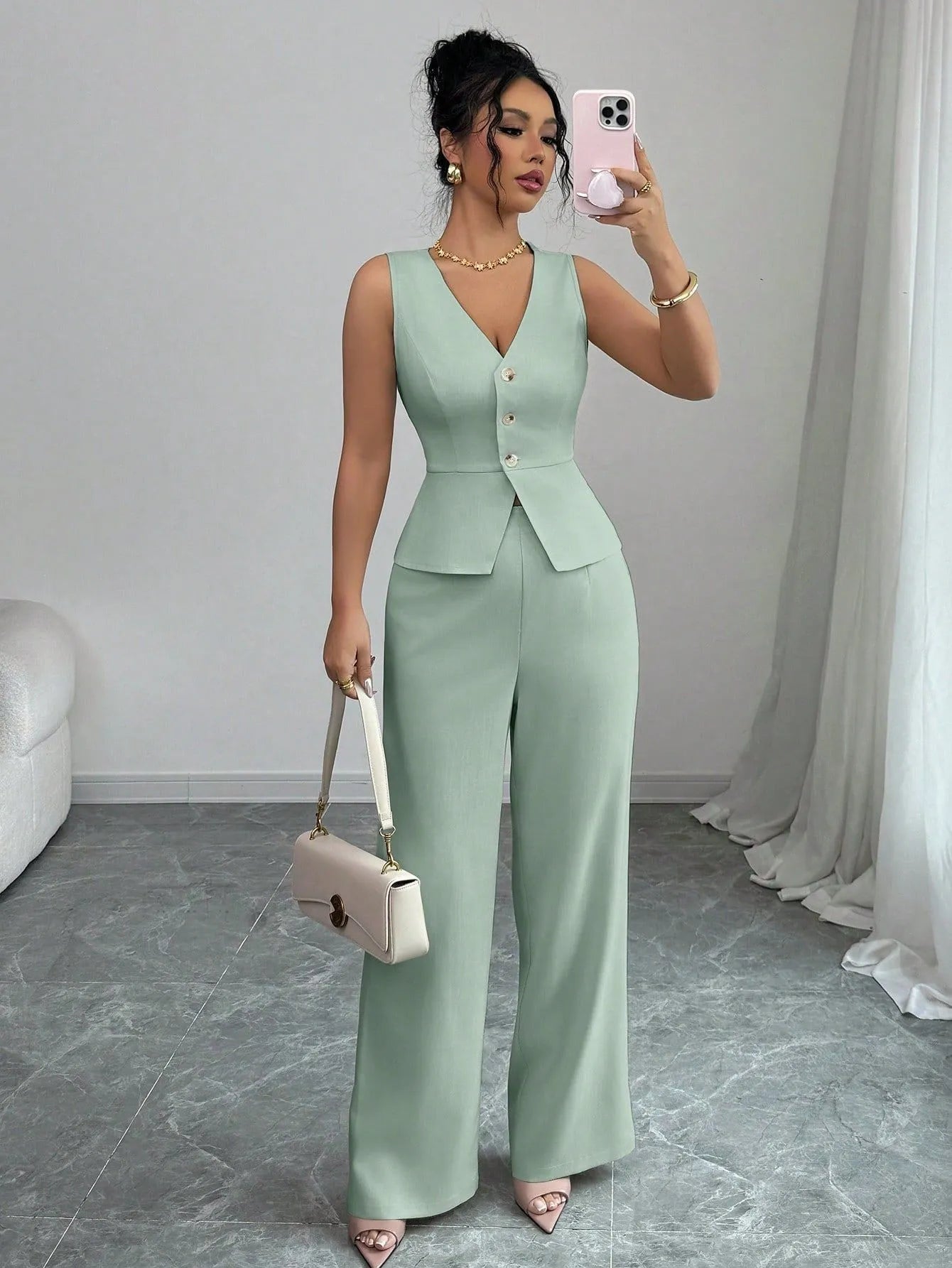 Women's sleeveless slim fit vest and high-waist trousers two-piece set in solid colour.