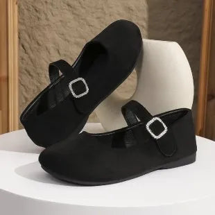 Men's black low-top canvas fisherman slip-on shoes with a flat rubber sole