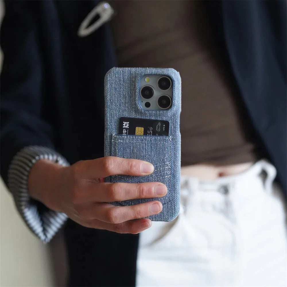 Denim card insert oil edge TPU phone case with magnetic suction for Apple iPhone models, back view showing card slot and rhinestone decoration.