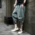 Casual ice silk harem pants in black, loose fit cropped length polyester fibre summer trousers for women