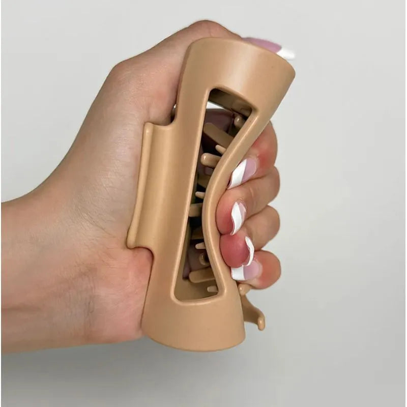 Soft silicone shark clip in 13cm size available in four colours with drop-resistant design