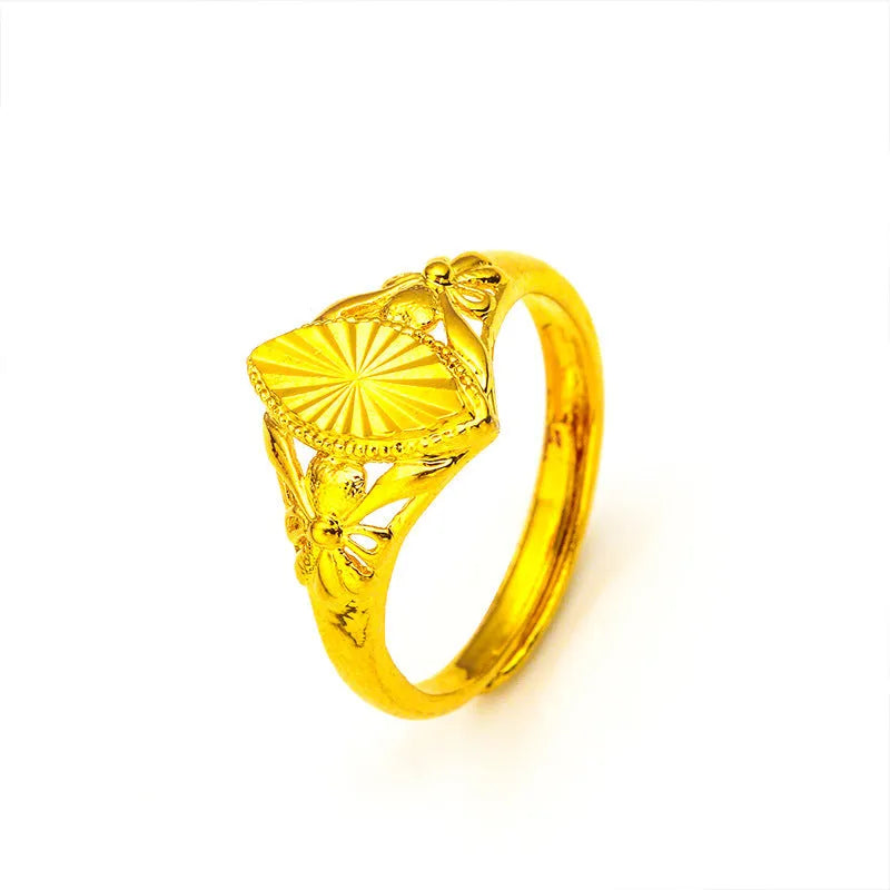 Open diamond flower ring in gold colour with geometric shape and textured details