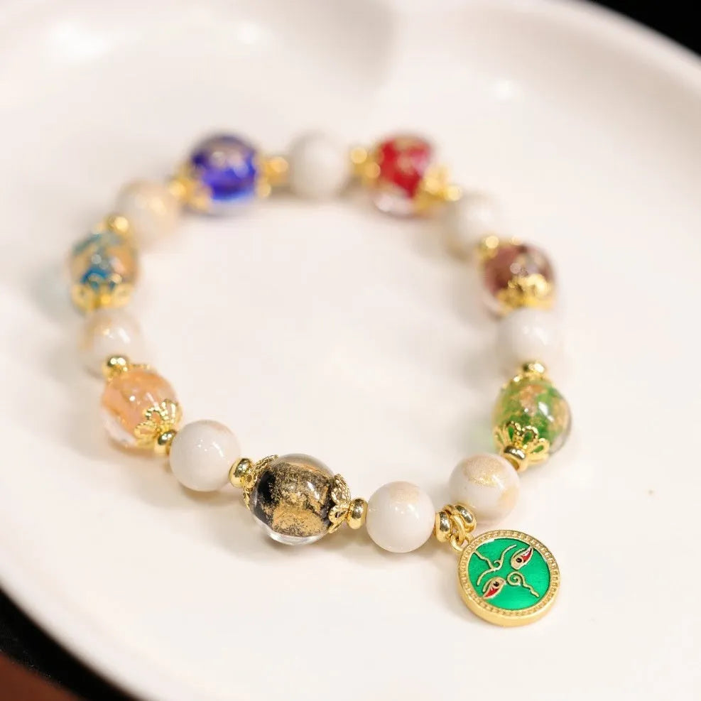 Handmade fragrant grey porcelain bracelet with gods of wealth charm and 10mm geometry beads