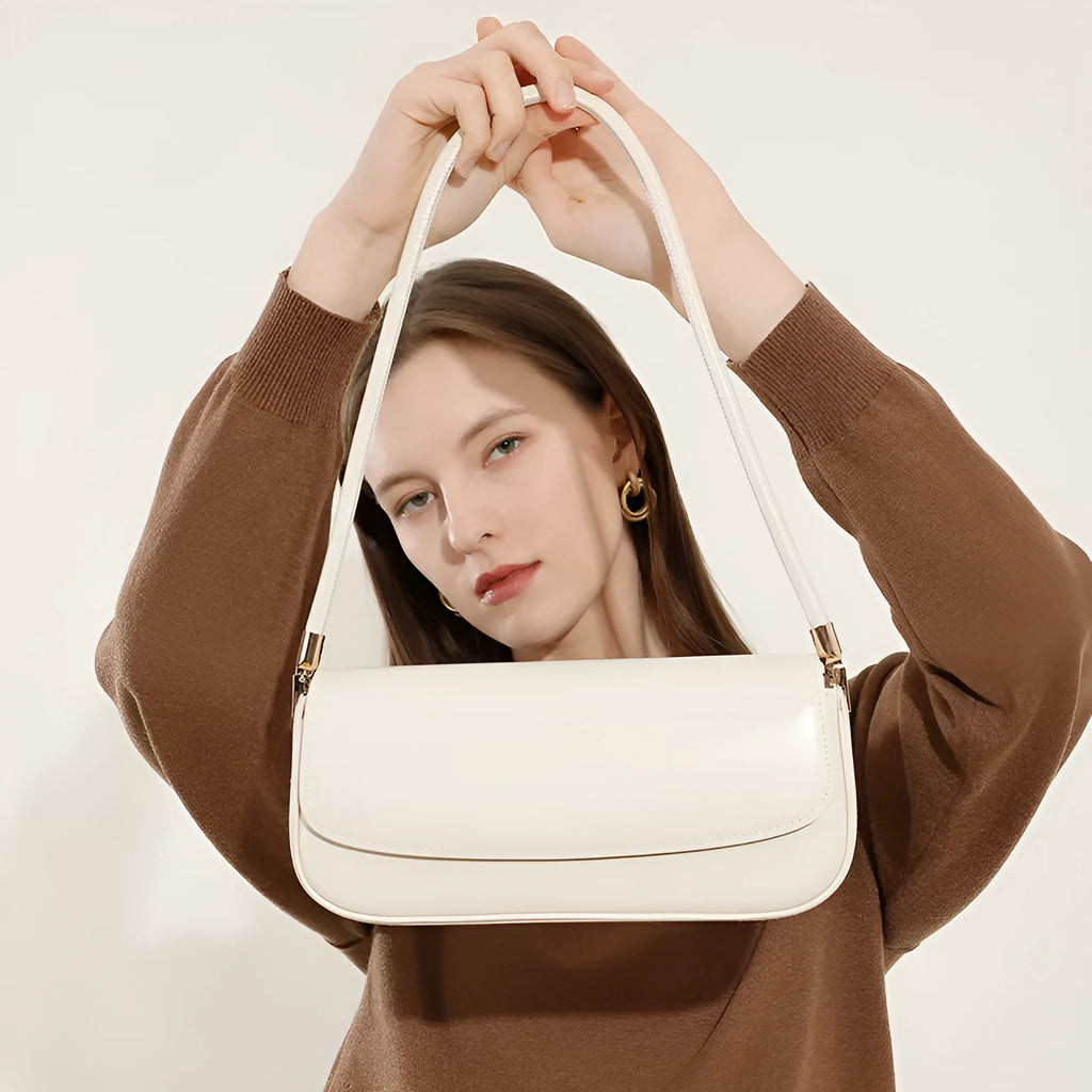 Genuine leather women's saddle bag in caramel, horizontal square shape with double straps