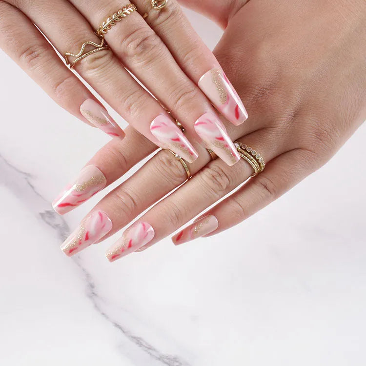One Second Wearable Manicure false nails set with 24 pieces showing rose, tulip, leopard print, and XINGX patterns