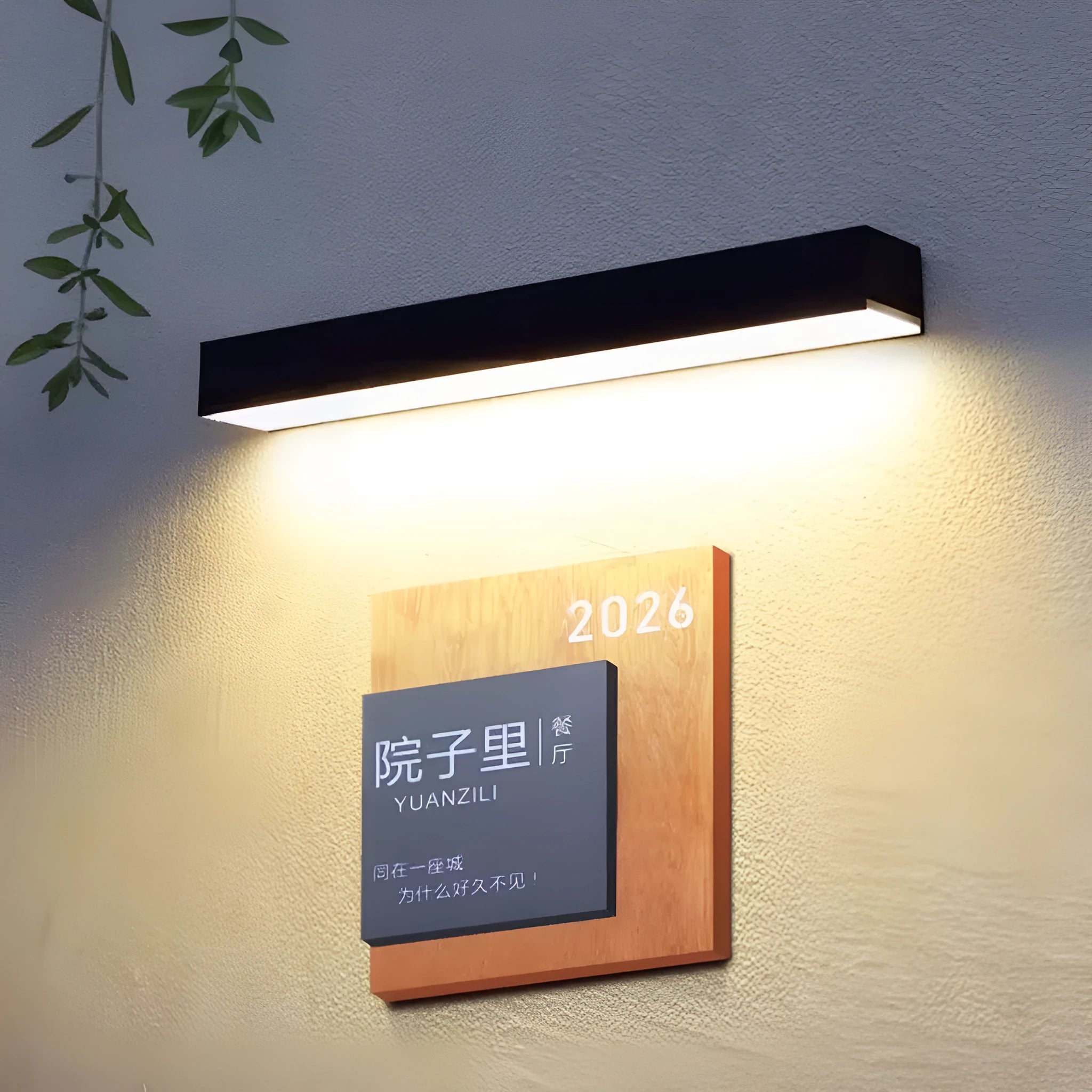 Black solar-powered outdoor wall lamp with IP65 waterproof rating for garden and patio lighting