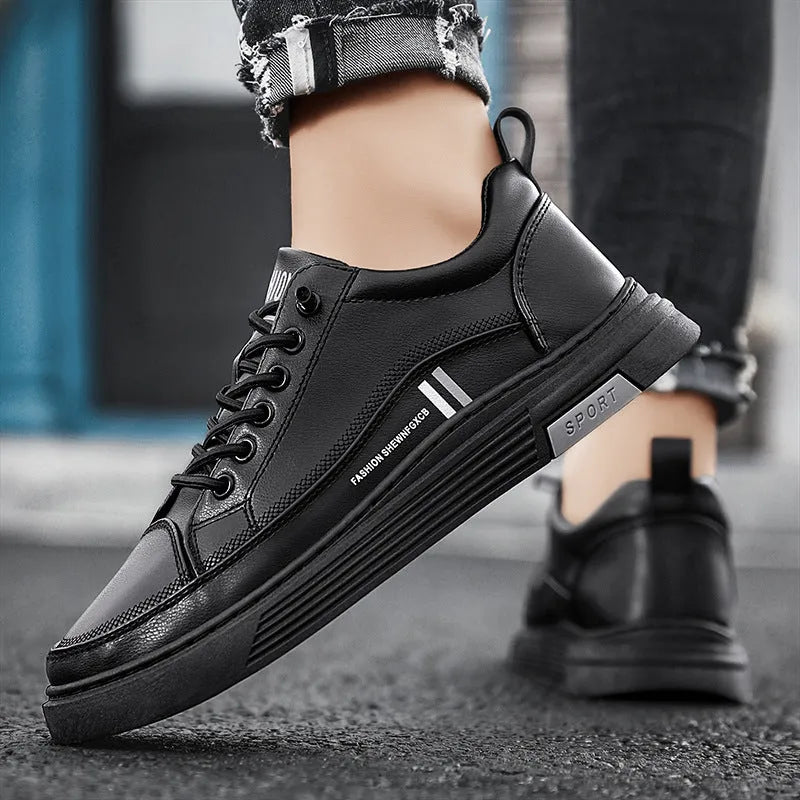 Men's low-top black and white skateboard shoes with elastic band closure and rubber sole