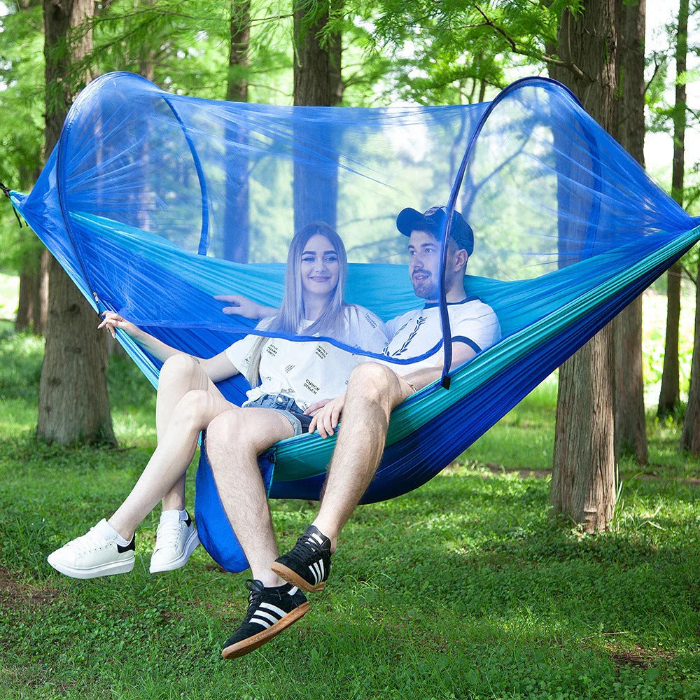 Cozy outdoor hammock with quick pop-up mosquito net, perfect for camping, hiking, and backyard relaxation