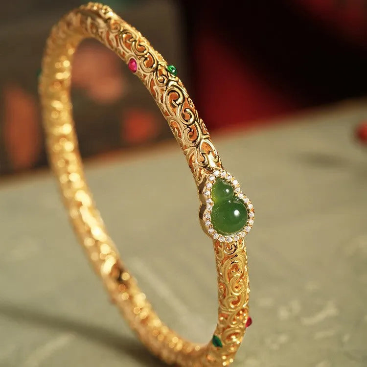 Gold-plated open xiangyun gourd charm bracelet on copper base for women