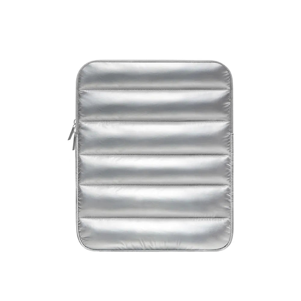 Fluffy black laptop sleeve with air puff padding for a 9.7-11 inch tablet, showing elastic edges.
