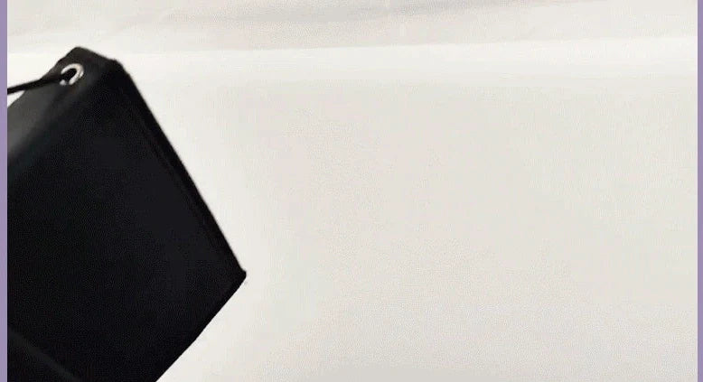 Black 15-piece makeup brush set with wooden handles and folding cloth storage bag