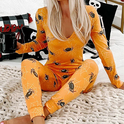 Stylish Halloween-themed pajama jumpsuit with long sleeves and a variety of vibrant prints