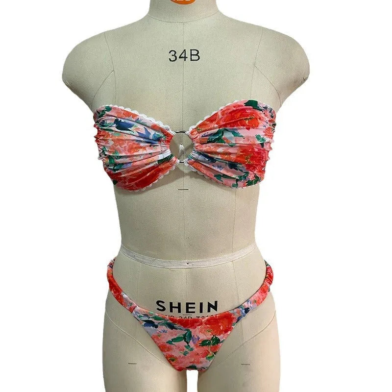 Blue floral print women's bikini set with lace trim on sleeveless tube top and matching briefs.