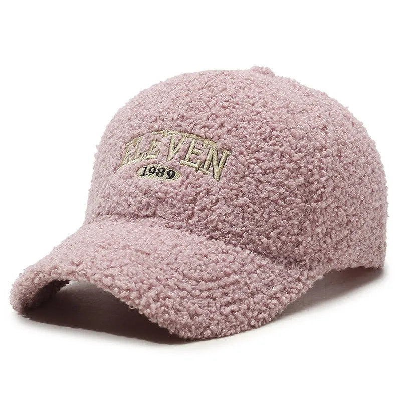 Adjustable lambskin-look winter baseball cap in dome crown style shown in multiple colours.