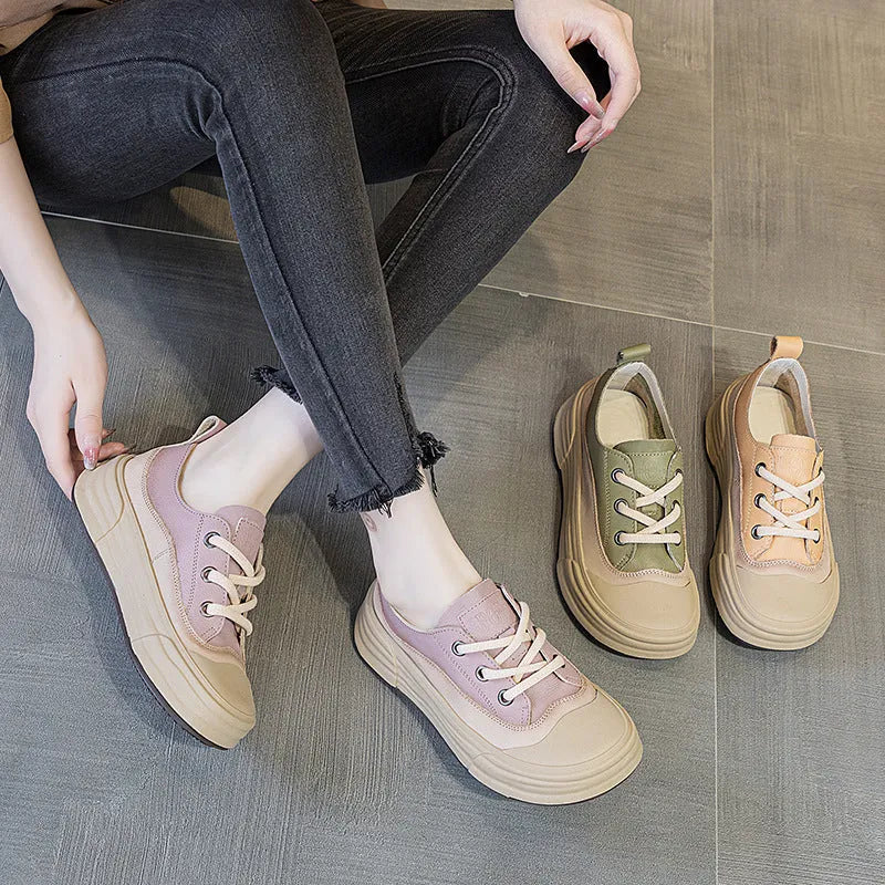 Women's matcha green leather platform sneakers with high ankle cut and lace-up front.