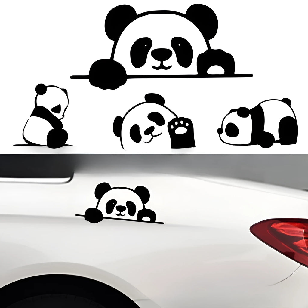 Close-up of a black and white peeking panda design on a vinyl car sticker.