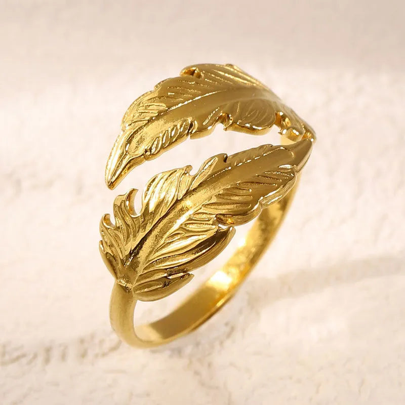 Adjustable titanium steel feather ring in silver or gold colour with electroplated finish
