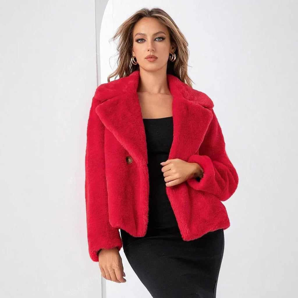 Women's loose short faux fur coat in rose red, shown on a model.