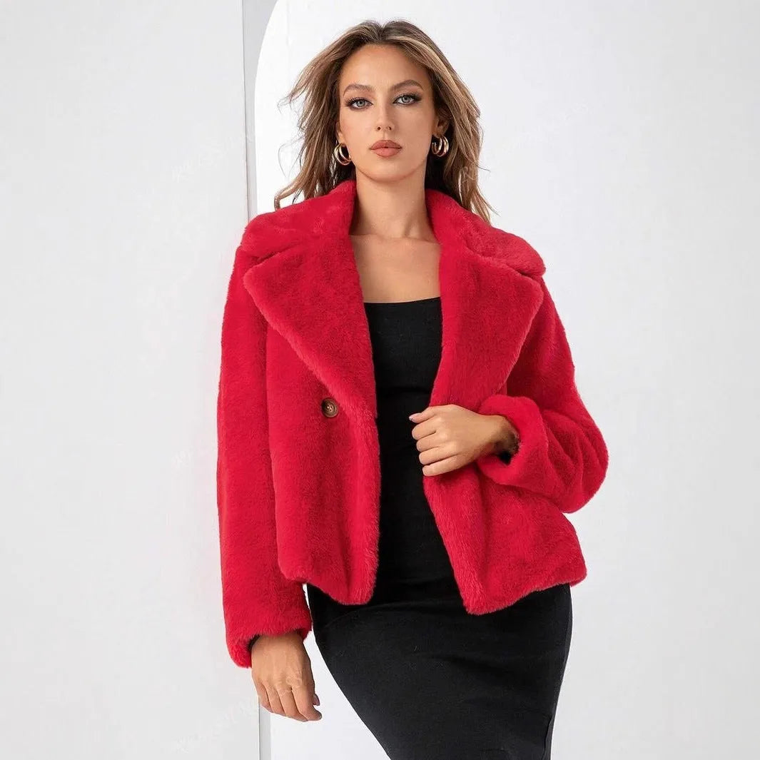 Women's loose short faux fur coat in rose red, shown on a model.