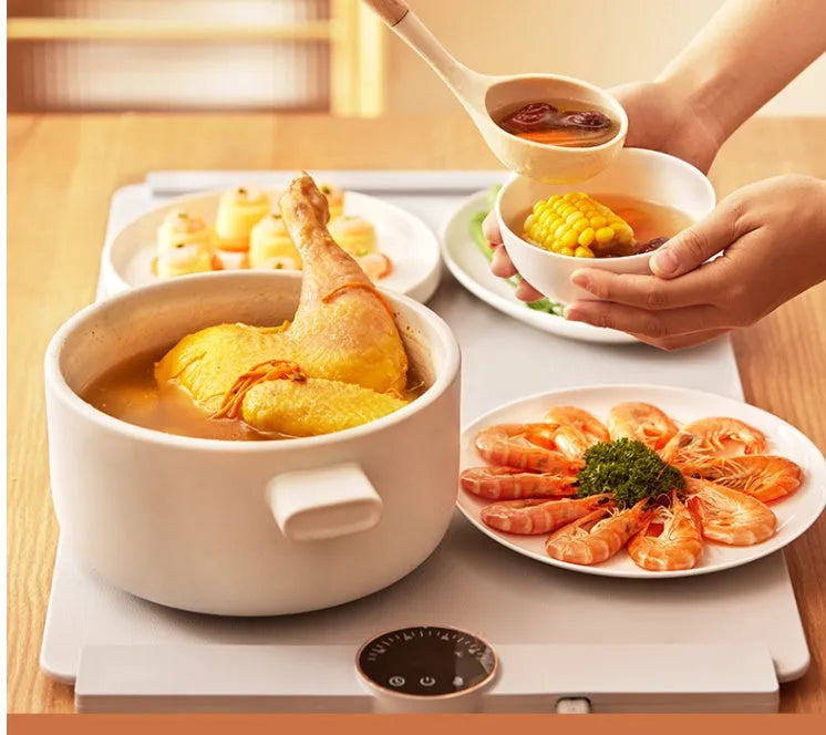 Elegant grey silicone flexible foldable electric warm chopping board with digital display on a kitchen counter