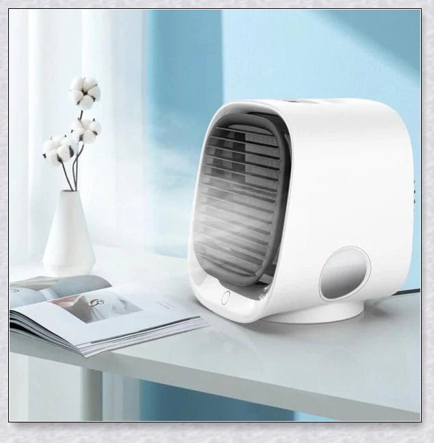 Chill Breeze - A lightweight, portable air conditioner with 3-in-1 functionality, including air cooling, air purification, and ambient lighting