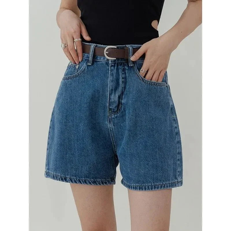 Stylish high-waisted denim shorts in a classic blue hue, perfect for Kiwi summer adventures