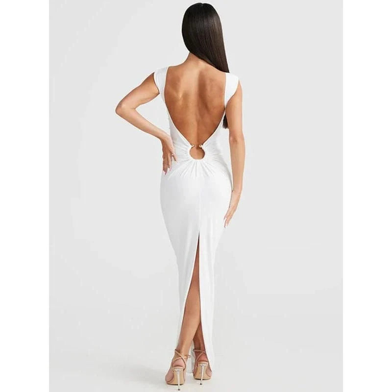 Elegant sleeveless maxi dress with a backless design, high waist details, and a sophisticated silhouette