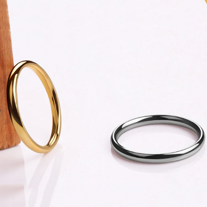 Elegant one-piece unisex ring with a thin 2mm band in four stylish colours: silver, gold, rose gold, and black