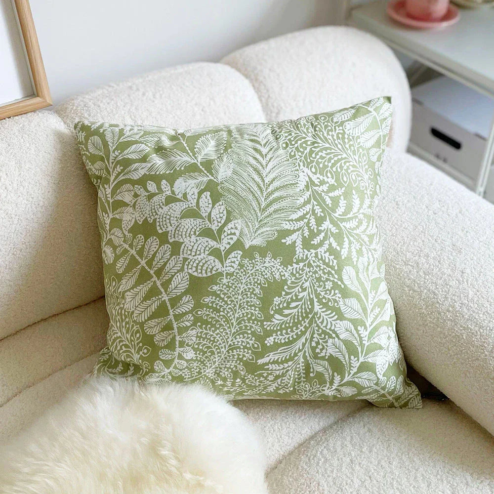 Elegant green floral throw pillow with woven polyester construction, waterproof feature, and multiple size options for Kiwi home decor