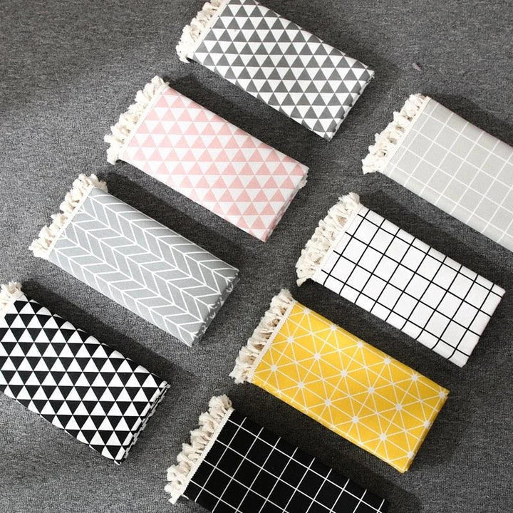 A stylish Nordic-inspired cotton tablecloth in various sizes, suitable for Kiwi homes and dining experiences.