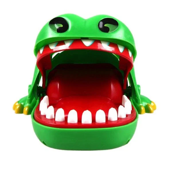 Vivid green crocodile with big eyes, wide open mouth, and sharp teeth - the Crocodile Dentist Game challenges players to carefully pull out the sore teeth using special tongs.