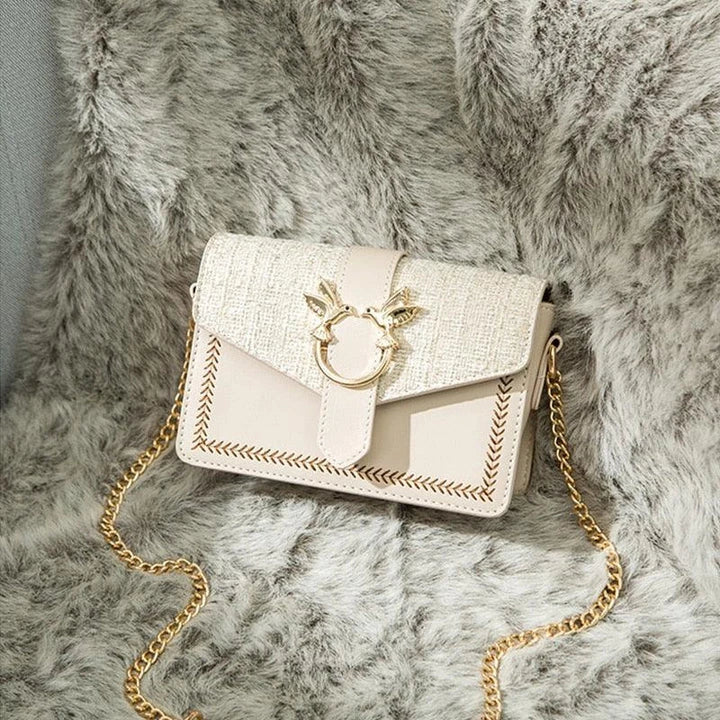 Elegant ladies chain shoulder bag made of premium artificial leather with a fashionable chain strap, perfect for Kiwi women.