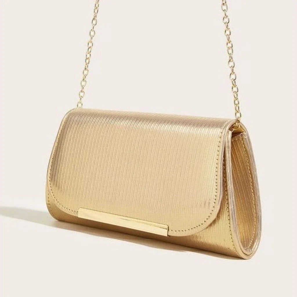 Elegant gold-colored striped PU leather clutch with detachable chain, perfect for Kiwi events and occasions