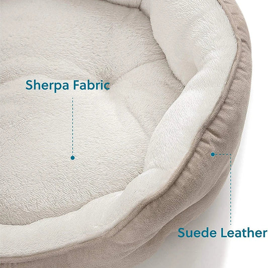 Cozy round small pet bed in beige color with soft microfiber fleece material and non-slip bottom